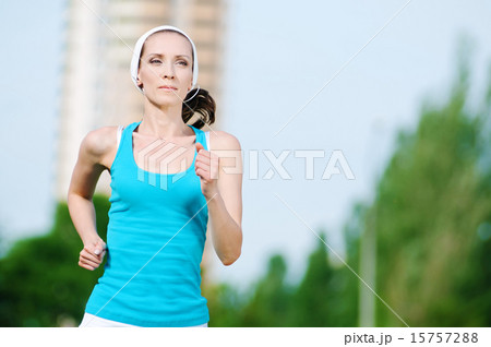 Beautiful woman running in green park Beautiful woman running in green park 15757288