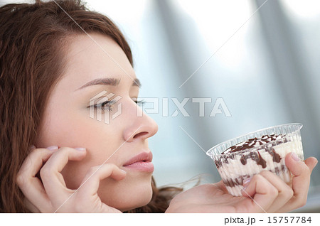 Young happy woman with cake Young happy woman with cake 15757784