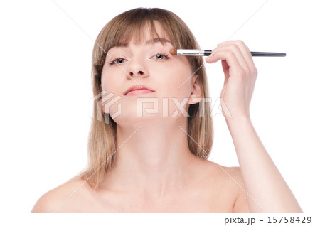 Beautiful woman with make up brush 15758429
