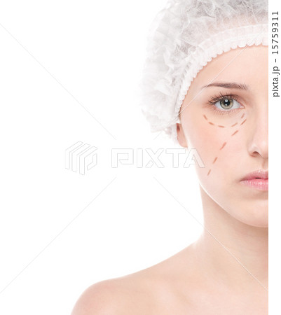 Beautician draw correction lines on woman face 15759311