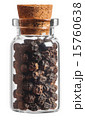 Black pepper spice in a little bottle isolated 15760638