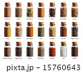 different spices in a little bottles isolated  15760643