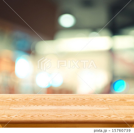 Empty wood table and blur cafe light Empty wood table and blur cafe light 15760739