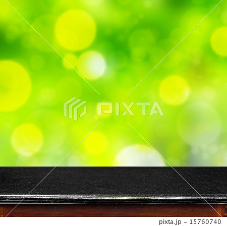 Marble table with green bokeh backgournd 15760740