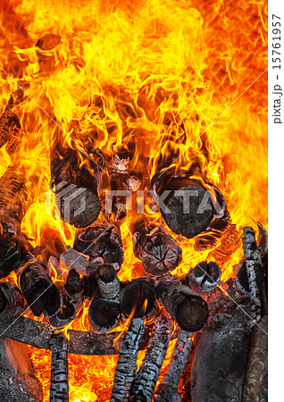firewood burning in fire 15761957