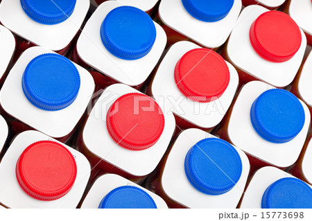 dairy products bottles stand in rows, bright cover dairy products bottles stand in rows, bright cover 15773698