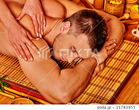 Man getting bamboo massage. 15783955