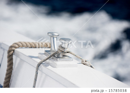 boat bollard detail on blue water background 15785038