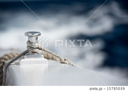 boat bollard detail on blue water background 15785039