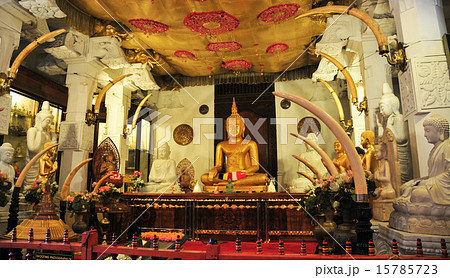 Buddha statues inside the Temple of the Tooth 15785723