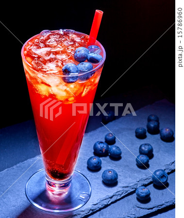 Cold red blueberry drink with berry 45. Cold red blueberry drink with berry 45. 15786960