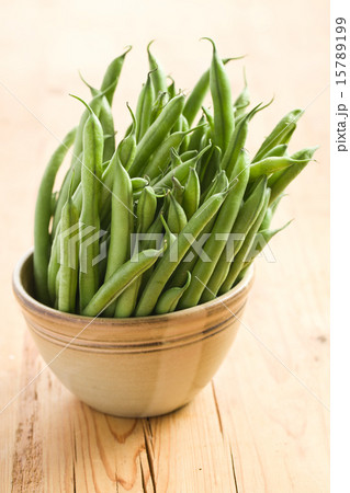 bean pods in brown bowl 15789199