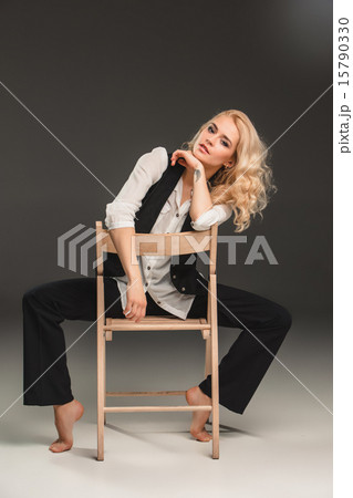 Beauty blond woman on chair 15790330