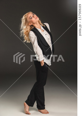 Beauty blond woman on a gray background 15790689