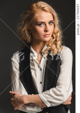 Beauty blond woman on a gray background 15790697