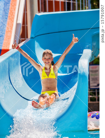 Child on water slide at aquapark. 15791007