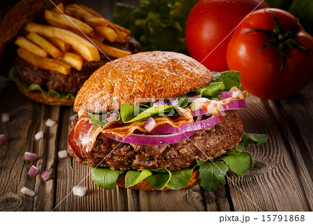 Burger with bacon close up. Burger with bacon close up. 15791868