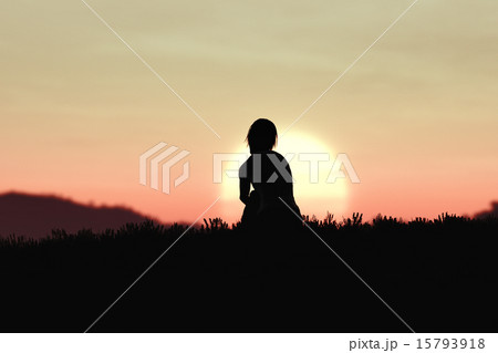 Young Adult Women Sitting on a Hilltop in Sunset Young Adult Women Sitting on a Hilltop in Sunset 15793918