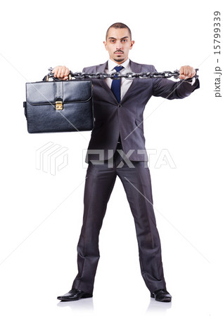 Businessman with shackles on white Businessman with shackles on white 15799339