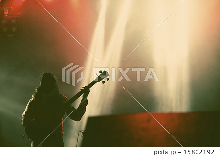 Guitarist silhouette in smoke during concert 15802192