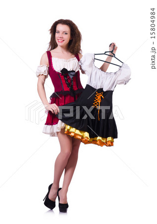 Woman trying to choose dress on white 15804984