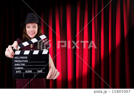 Woman gangster with movie clapper 15805007