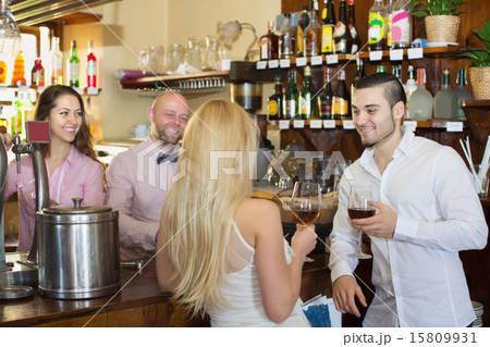 Couple drinking wine at bar 15809931
