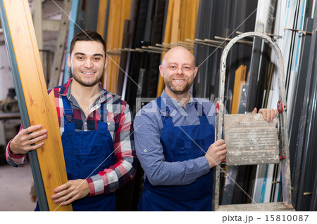 Two smiling workmen at factory Two smiling workmen at factory 15810087