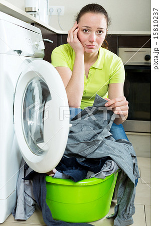 Unhappy girl with dirty clothes Unhappy girl with dirty clothes 15810237