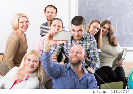 Professionals and coach making group portrait Professionals and coach making group portrait 15810714