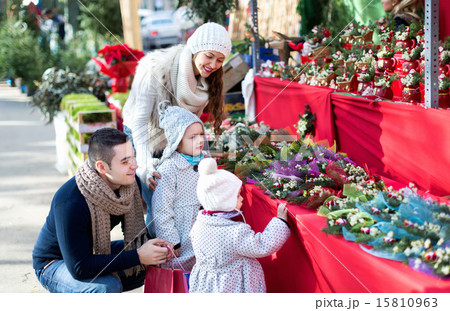 Family of four at Christmas market Family of four at Christmas market 15810963