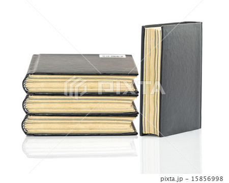 Black hardcover book on white glossy background Black hardcover book on white glossy background 15856998