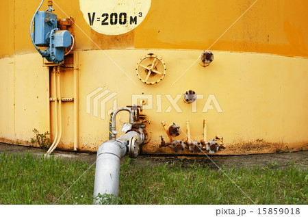 old yellow wall of the fuel tank  15859018