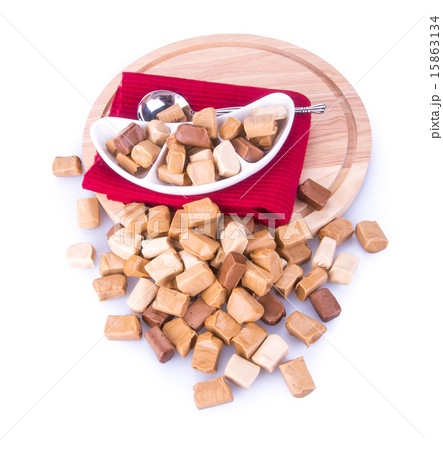 caramel candies on a background. caram 15863134