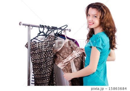Woman trying new clothing on white Woman trying new clothing on white 15863684