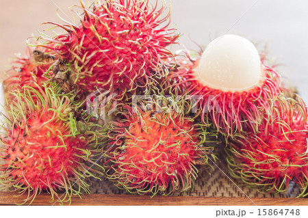 Fresh rambutans on wodden tray Fresh rambutans on wodden tray 15864748