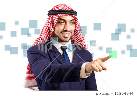 Arab man pressing virtual buttons 15864944