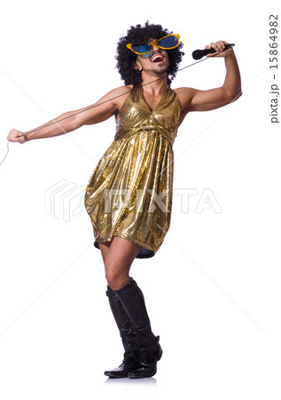 Man in female clothing singing with mic 15864982