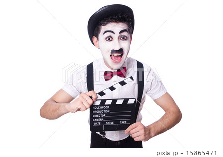 Man with movie clapper isolated on white Man with movie clapper isolated on white 15865471
