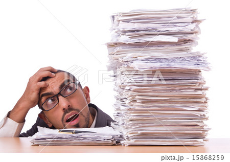 Busy businessman with lots of papers 15868259