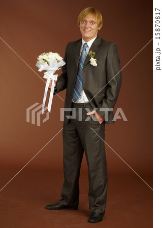 Happy groom with bouquet Happy groom with bouquet 15870817