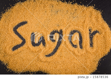 word sugar written in brown granulated sugar word sugar written in brown granulated sugar 15878536