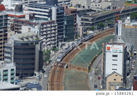 関空特急はるかと大阪の街並み 15883261