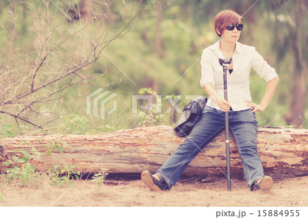 Smart Asian photographer wearing sunglasses Smart Asian photographer wearing sunglasses 15884955
