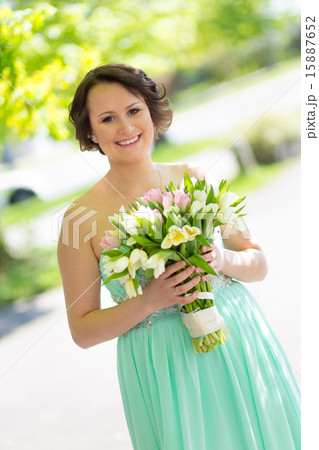 Happy bride with wedding bouquet. 15887652