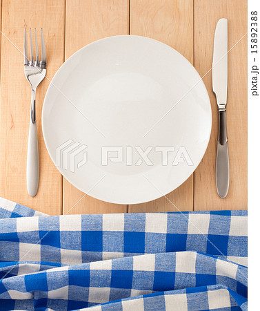 kitchen utensils and cloth napkin on wood 15892388