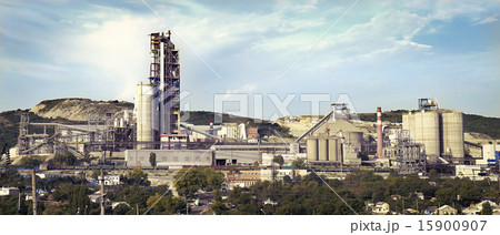 panorama of a cement plant in a sunny summer afternoon panorama of a cement plant in a sunny summer afternoon 15900907