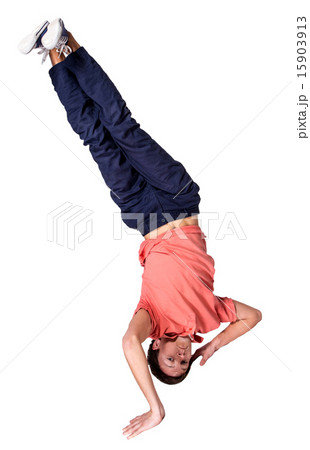 Break dancer doing one handed handstand against a white background Break dancer doing one handed handstand against a white background 15903913