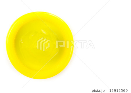 yellow condom on white background from topview yellow condom on white background from topview 15912569