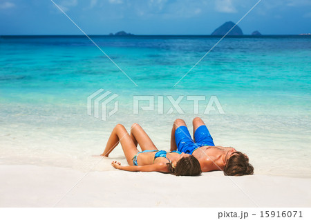 Young couple on the tropical beach Young couple on the tropical beach 15916071